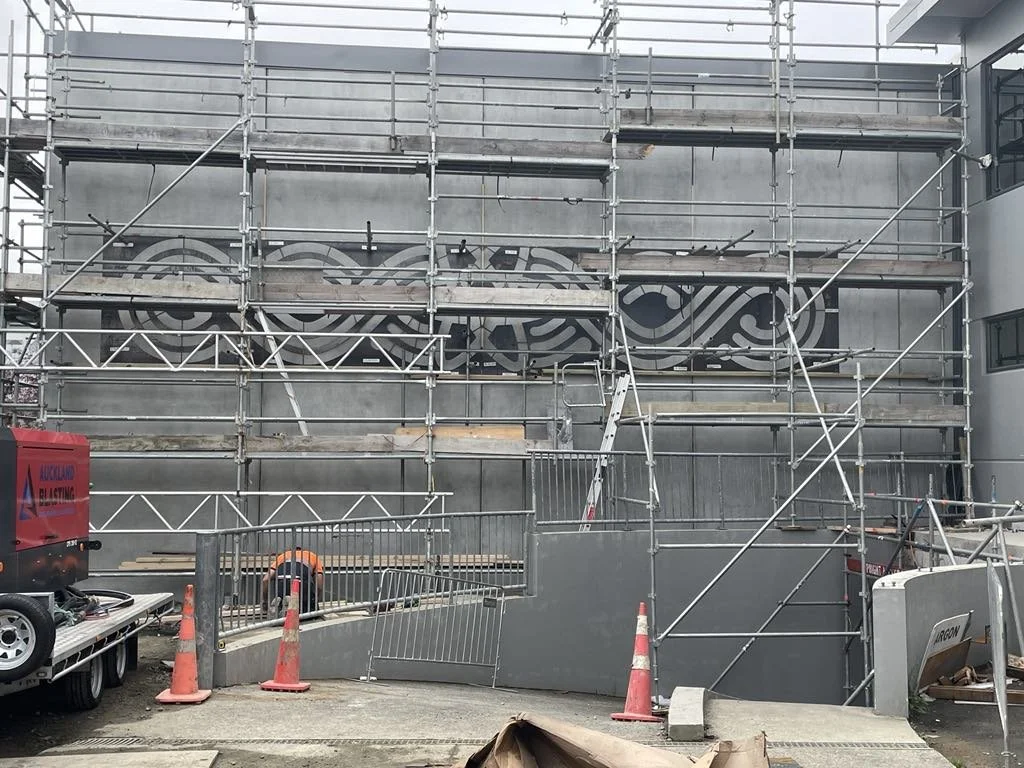 Concrete etching on a building facade.